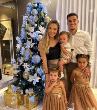 Aine Coutinho with her husband Philippe Coutinho and children.